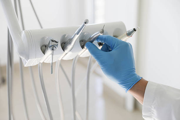 Professional Tooth Extraction technician working in Bloomington, TX